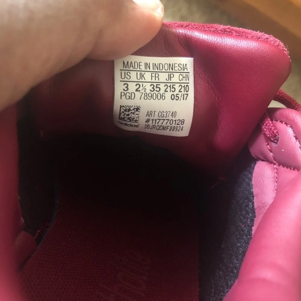 Adidas superstar suede burgundy shell toe sneaker.